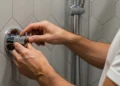 remove delta shower handle no visible screws